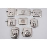 Collection of eight Victorian and later silver Vesta cases including three with applied skull