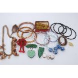 Vintage costume jewellery including Bakelite, glass bangles and rings