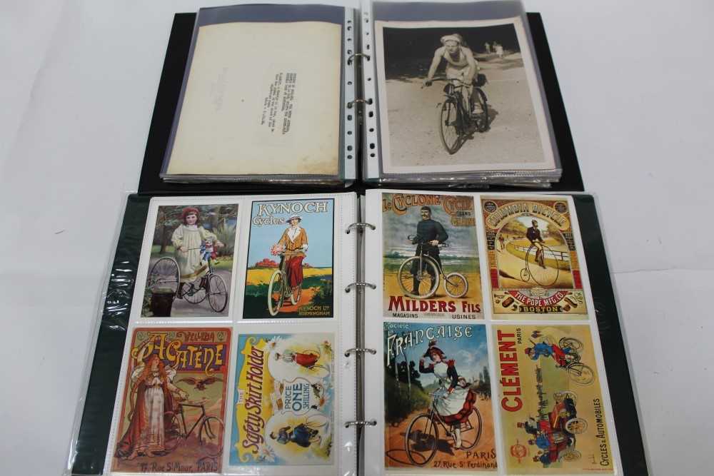 Two folders containing early cycling related photographs