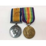 First World War pair comprising War and Victory medals named to 62947 Pte. A. W. G. Stone. M.G.C.