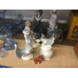 Group of Lladro style figures together with a Beswick Fox