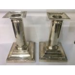 Pair of silver dwarf candlesticks