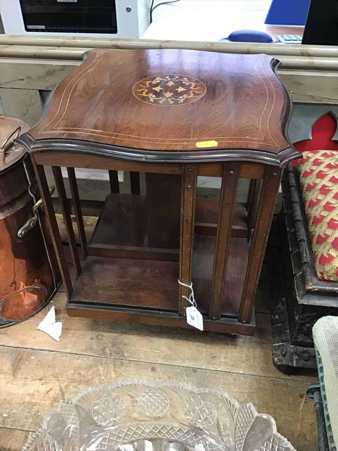 An Edwardian rosewood revolving table-top bookcase with inlaid stringing