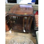 An Edwardian rosewood revolving table-top bookcase with inlaid stringing