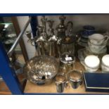Collection of assorted silver plated wares to include candlesticks and teapot