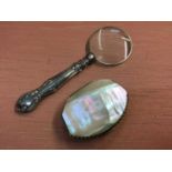 Silver magnifying glass, mother of pearl mounted purse