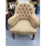 Victorian-style buttoned back tub easy chair on turned legs