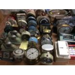 Selection vintage bedside alarm clocks, mantle clocks and a plated serving dish