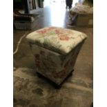 Victorian box ottoman with floral upholstery on bun feet