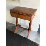 Victorian walnut table with fold over revolving top