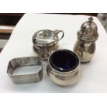 Silver three piece cruet set and silver napkin ring