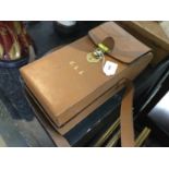 1920s leather map case and vintage maps