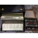 Piano accordion together with another in original box