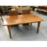 Walnut extending dining table with two extra leaves on taper legs, purchased from Heals circa 1960's