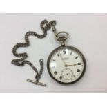Silver pocket watch on silver chain