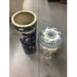 Blue and white umbrella stand and oriental style stool