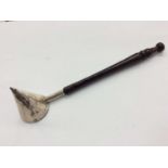 Silver candle snuffer with turned wood handle