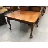 Edwardian walnut extending dining table with two extra leaves on cabriole legs