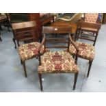 Set of nine Regency style mahogany dining chairs with upholstered seats