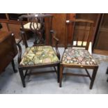 Two George III mahogany dining chairs,
