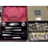 Dutch white metal teaspoons, other plated souvenir spoons and silver manicure set in fitted case