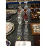 Group of glass decanters, stoppers and other glassware