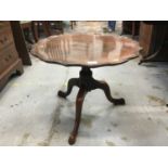 19th century mahogany occasional table with shaped top on turned column and tripod base
