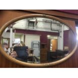 19th century oval gilt wall mirror