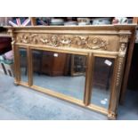Good quality antique style triple plate bevelled wall mirror in ornate gilt frame