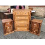 Pair of bedside tables and a pine chest of drawers