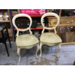 Pair Victorian-style cream painted balloon back dining chairs