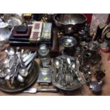 Silver plated ware to include Edwardian three piece tea set, punch bowl, canteen of cutlery