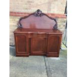 Victorian mahogany credenza with arched panel gallery