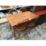 Dining table and four matching stick back chairs