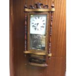 Victorian wall clock with square painted dial in a parquetry inlaid case