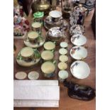 Group of Imari teaware, Royal Doulton Dickens Ware, cow creamers and plaster plaques