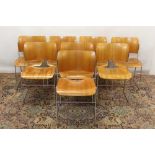 Set of eight Howe 40/4 plywood stacking chairs by David Rowland, bent ply back and seat on metal rod