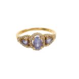 18ct gold tanzanite and diamond cluster ring