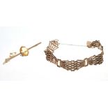 9ct gold gate bracelet with padlock clasp and a citrine bar brooch
