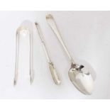 Early silver table spoon, a pair of Georgian silver sugar tongs and a white metal marrow scoop.