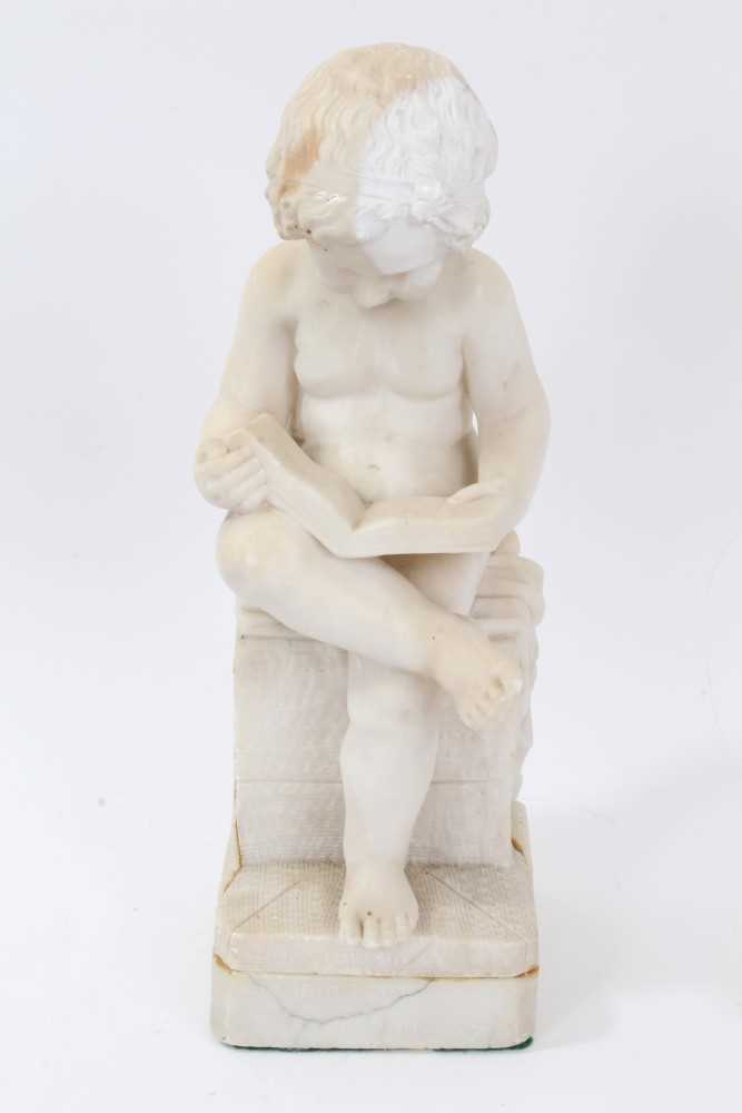 19th century Continental carved white marble figure of a putto reading a book