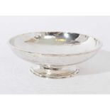 Contemporary Guild of Handicraft silver dish of circular form.