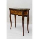 Late 18th/early 19th century French kingwood and rosewood sewing table with leather inset top
