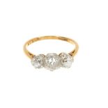 Antique diamond three stone ring