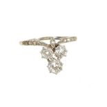 Edwardian diamond ring with three old cut diamonds in a clover leaf shape cluster