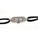 Art Deco ladies' platinum and diamond cocktail wristwatch with diamond set bezel and lugs in platinu