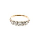 Mid Victorian diamond five stone ring with five old cut diamonds in silver collet setting, carved sh