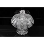 Victorian diamond cut glass urn and cover, the fluted bowl on a stepped and faceted stem, above a st