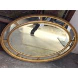 Edwardian oval gilt framed wall mirror
