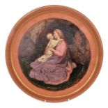 Victorian round terracotta plaque, finely painted with a scene of a woman embracing a child, 37cm di